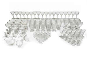 An etched crystal part stemware service, by J & L Lobmeyr, Austria, late 19th/early 20th century, each finely engraved with foliate scrollwork and trellis desi