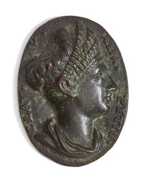 A bronze oval medallion After The Antique
		With the bust of a Roman lady of high birth, with ornately bound hair, with lettering around the edge, 5.7cm, ink 