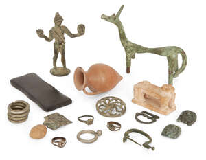 A miscellaneous group of bronze, silver, pottery and stone objects
		Various Periods, 8th Century B.C. - Modern
		Including an Italic bow brooch, circa 8th-7