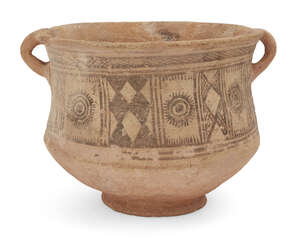 A buffware pottery vessel with hatched decoration, Persia, 3rd millenium BC, on a raised foot,with small handle either side, 26cm. diam. x 20cm. high