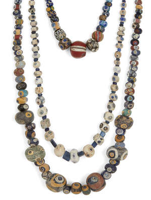 Two Eastern Mediterranean 'eye' bead necklaces
		Circa 5th-3rd Century B.C. and Later
		A necklace composed of polychrome spherical 'eye' bea