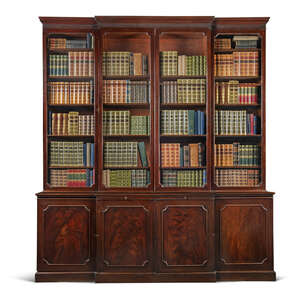 A George III mahogany breakfront bookcase, late 18th century, the fluted cornice above four glazed doors to the upper section each enclosing five adjustable sh