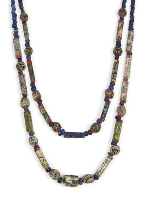 Two Roman mosaic glass bead necklaces
		Circa 1st Century B.C./A.D. and Later
		A necklace composed of eight spherical millefiori beads, interspersed with se