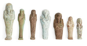 Six Egyptian glazed faience shabtis
		Third Intermediate-Late Period, 1070-332 B.C.
		Each of typical mummiform, including a miniature pale blue glazed shabt